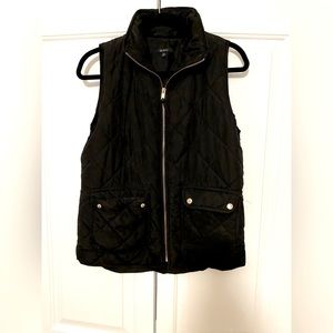 Francesca’s black puffer vest